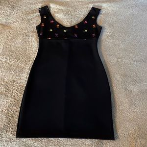 Adorable excellent used condition nouveau stretch sundress. Polyester spandex.